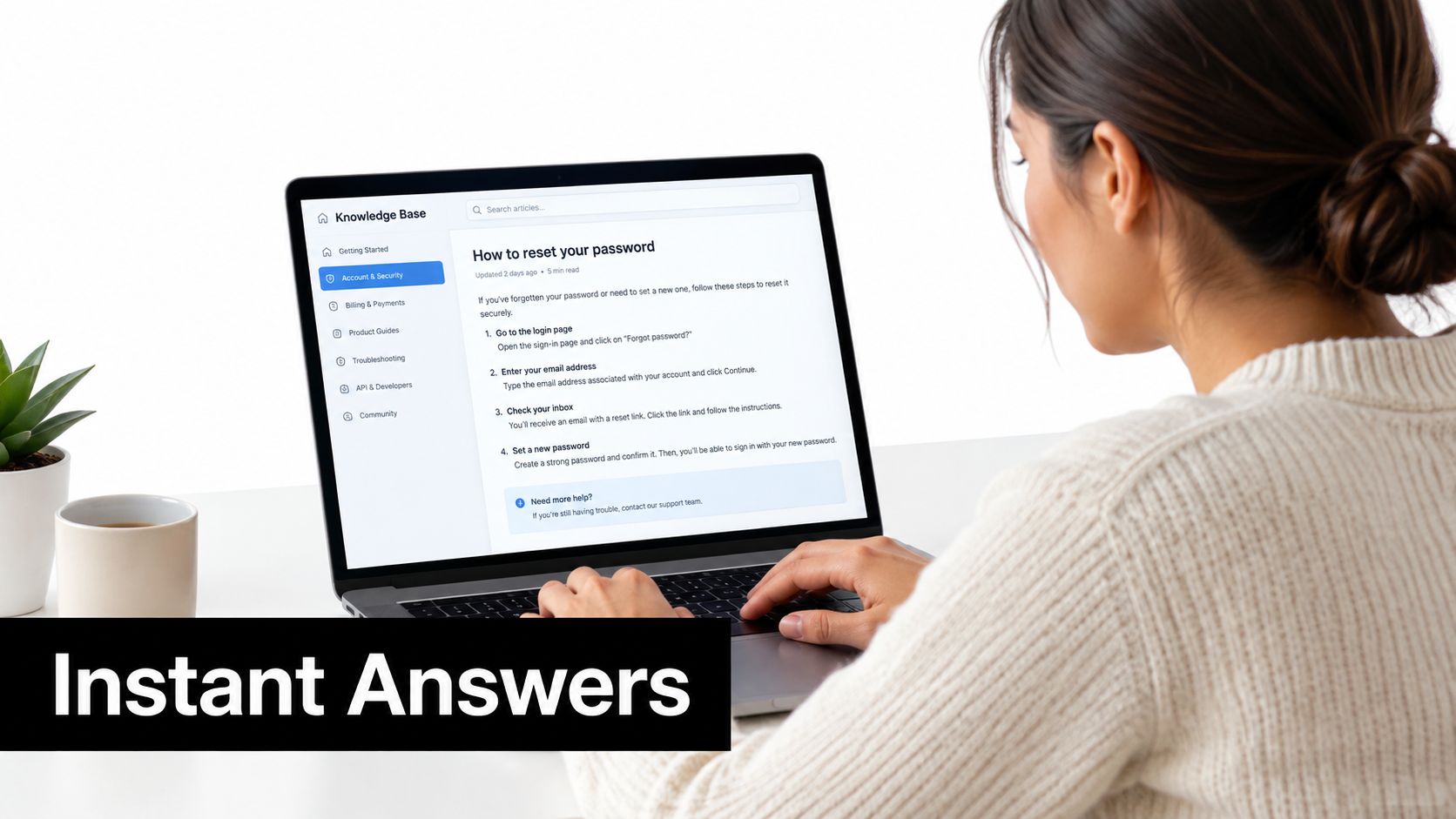A woman using a laptop to view an online knowledge base guide on how to reset a password.